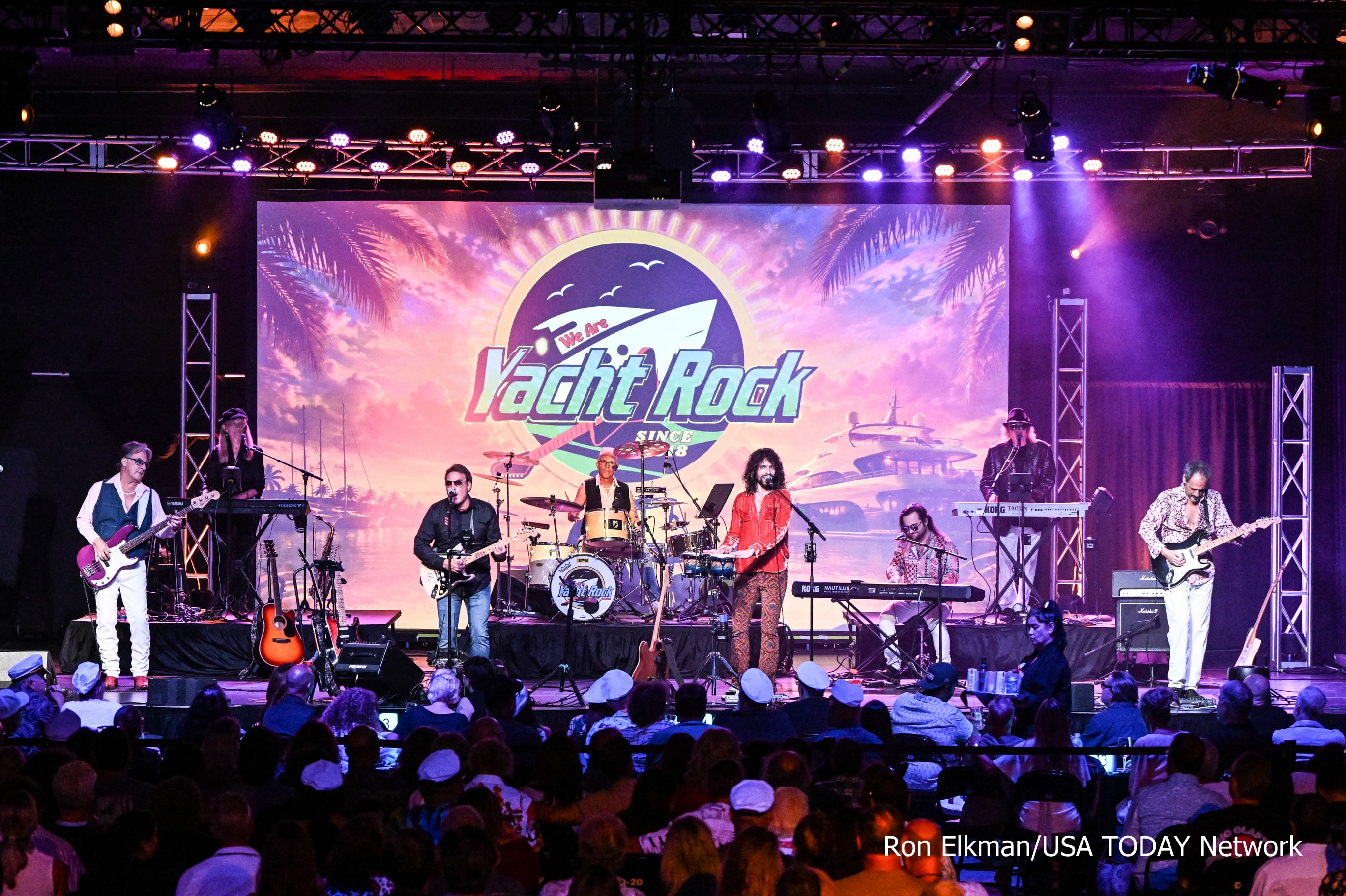 We Are Yacht Rock performing live onstage for a concert audience